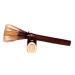 chasen mit halter besen legt auf halter