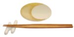 kumo set stäbchen auf ablage dahinter ein diptellerchen